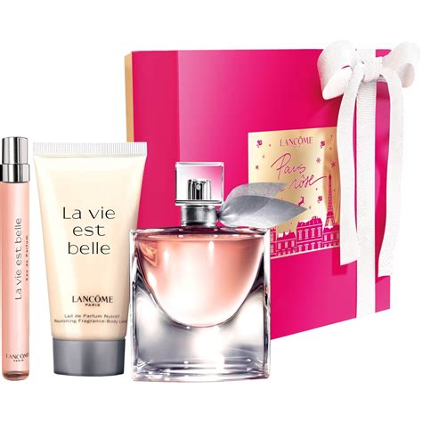 La Vie Est Belle 2024 Holiday Fragrance and Candle Set.